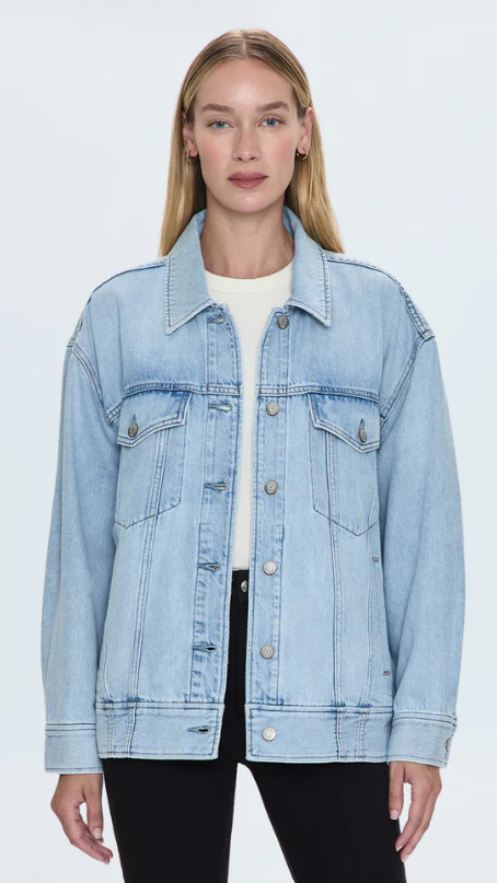 Pistola Rowan Boyfriend Trucker Light Wash Denim Jacket. Cut in our soft fluid tencel blend denim, the ROWAN sits oversized and relaxed on the body, and washed to a beautiful light vintage shade.
• Length: 27 1/2”
• Model is 5’9” wearing size Small
• 62% Cotton / 38% Lyocell