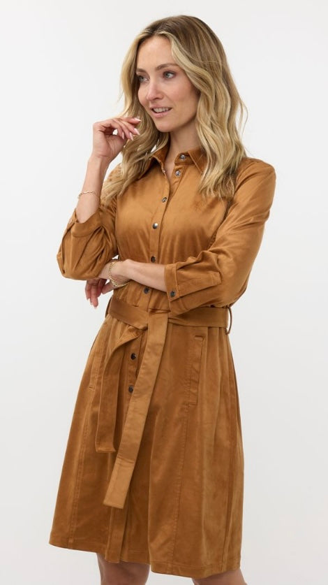 Esqualo Suede Suedine Camel colored Belted Shirt Dress / Duster with adjustable snap buttons and waist tie detail. A-line dress features snaps and a bow belt to accentuate the waist.