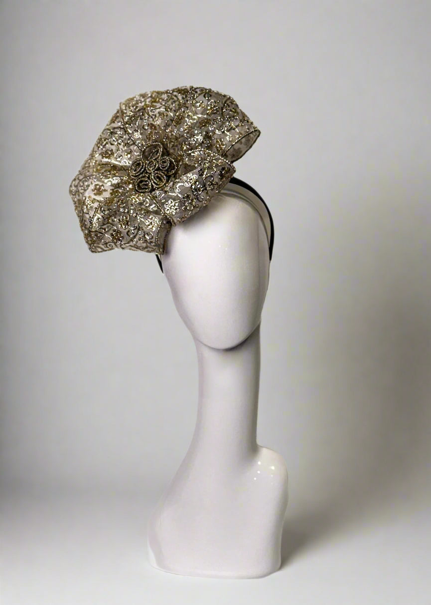 Black sinamay fascinator with silver sequence embroidered ribbon bows and rosette accents, kentucky derby fascinator, mamili boutique & mad hatter 502 handmade derby headpieces, kentucky derby headpiece